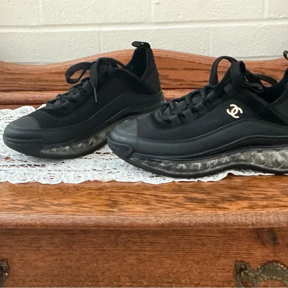 CHANEL Black Women’s Sneakers with Gold Logo